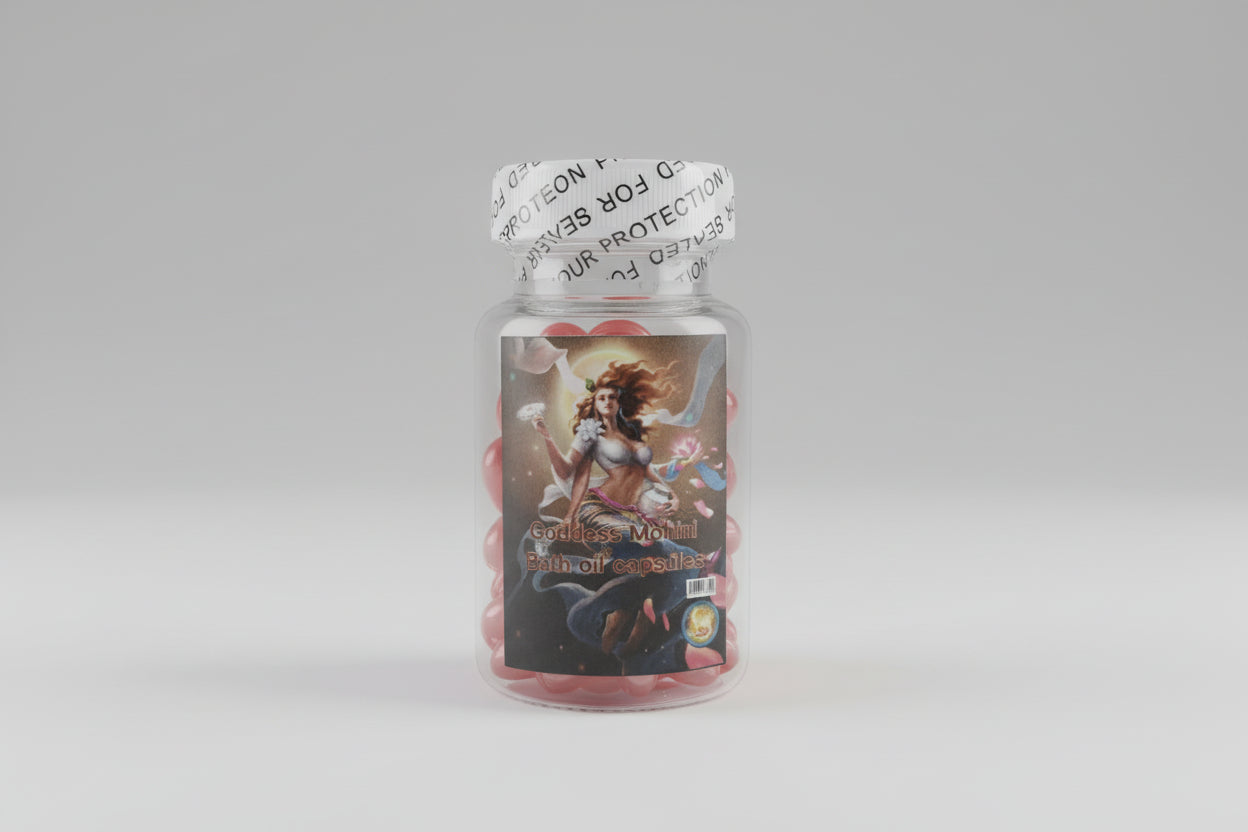 A bottle of Goddess Mohini bath oil capsule with a label featuring an illustration of a female figure, presumably the goddess, in a dynamic pose with a pink and golden color scheme.
