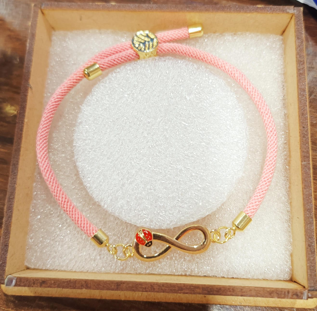Pink Thread Infinity Bug Bracelet