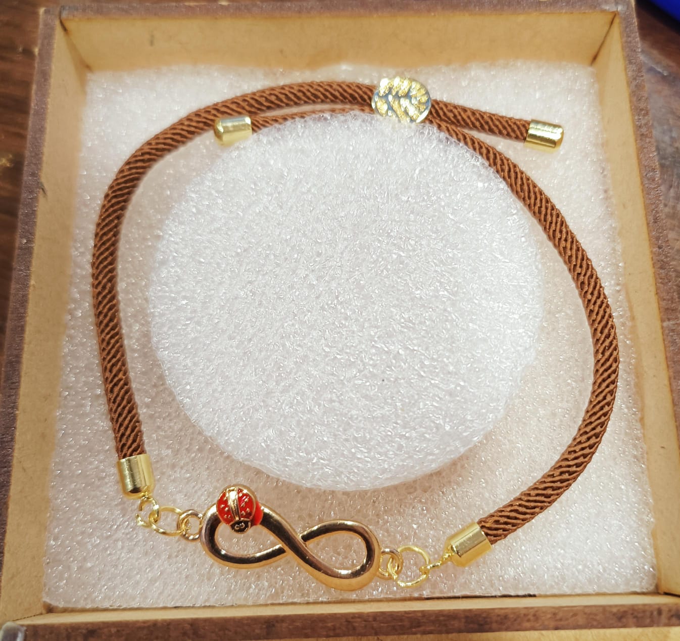 Brown Thread Infinity Bug Bracelet