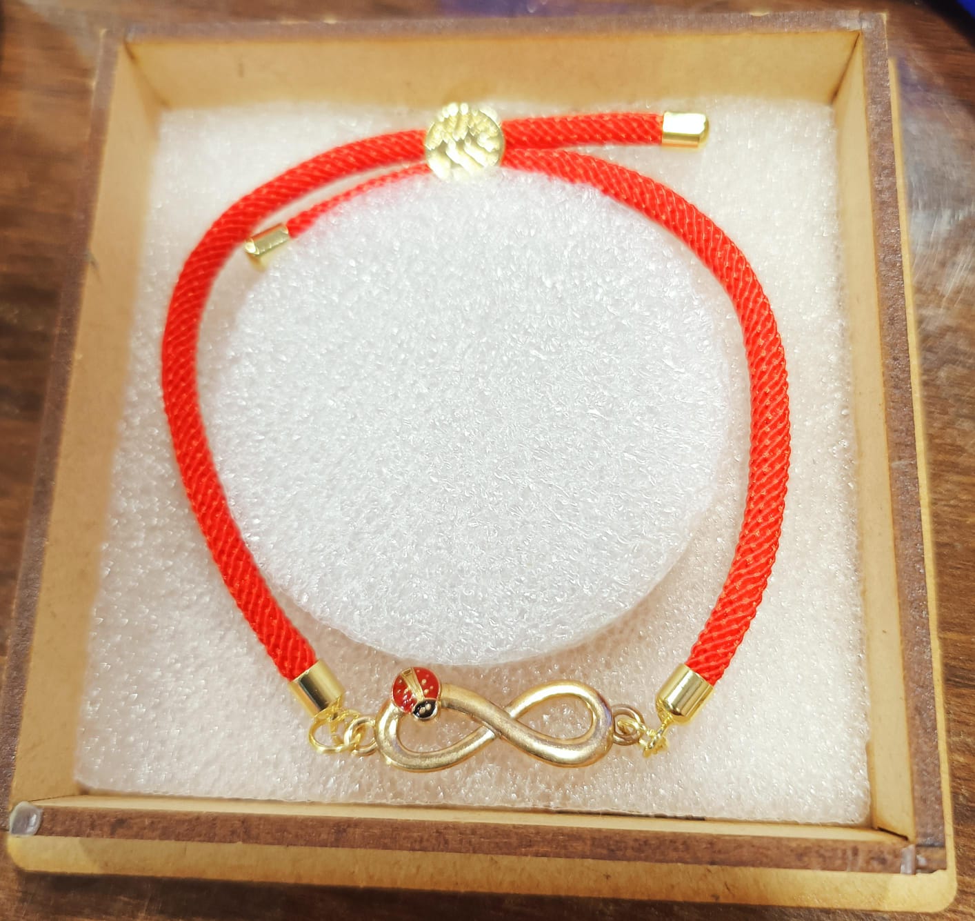 Red Thread Infinity Bug Bracelet