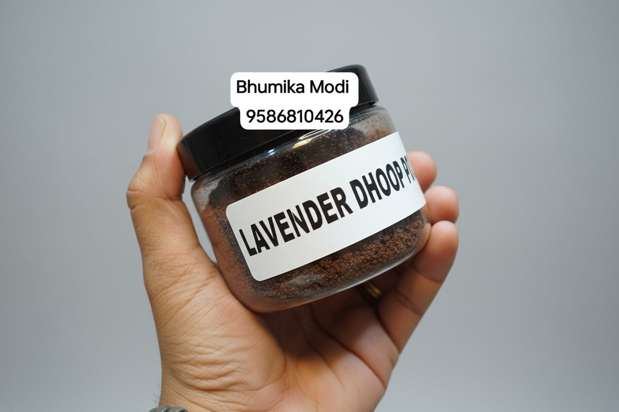 A jar of Lavender Dhoop Powder held in a person's hand, with a label on the jar.