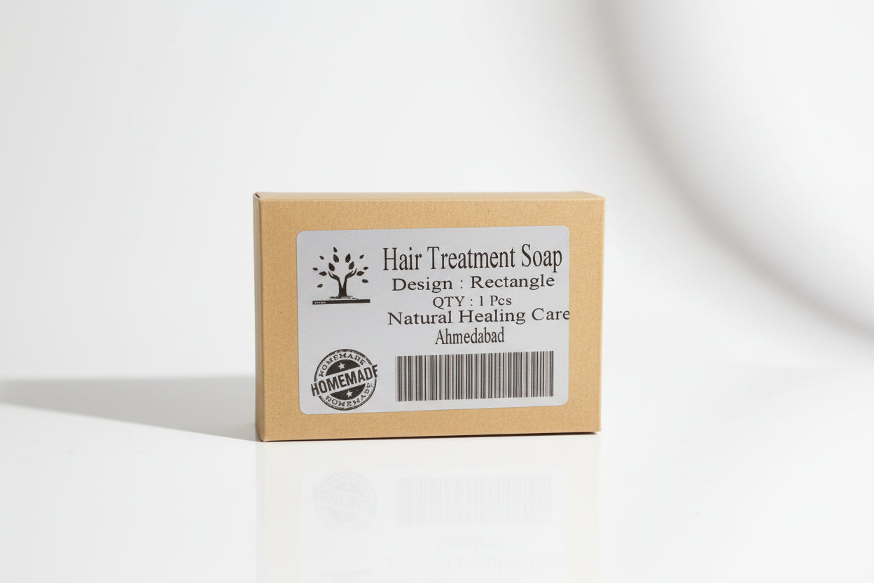 Packaging box for Hair Treatment Soap with a label that includes a tree logo, product name, and the mention of being a homemade product from Natural Healing Care, Ahmedabad.