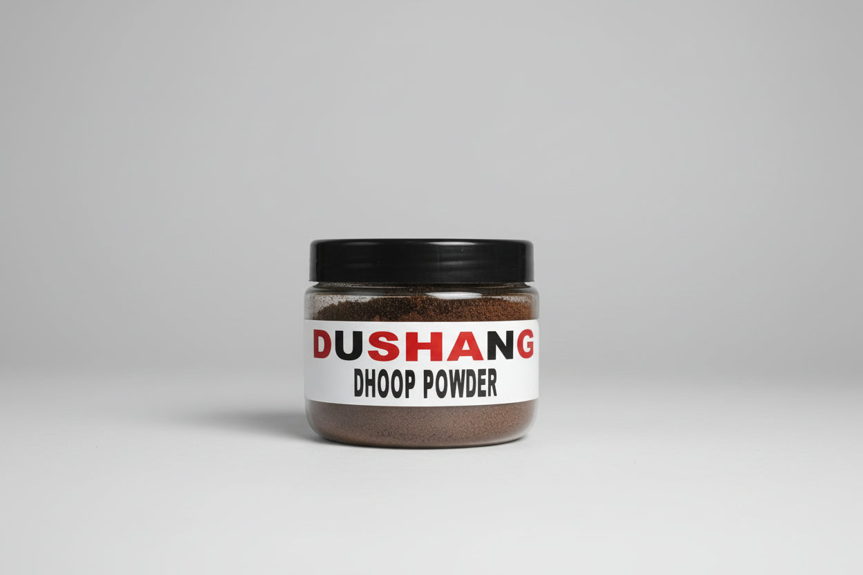 A jar labeled 'DUSHANG DHOOP POWDER' held in a person's hand, with a red background.