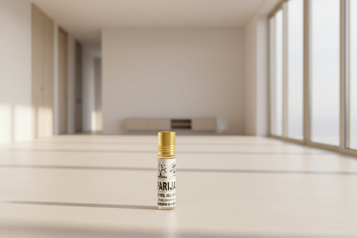 Small bottle labeled 'Parijat' on a red surface with a colorful background