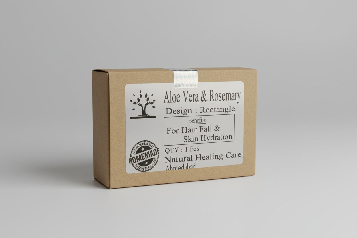 Packaged bar soap with Aloe Vera & Rosemary label, indicating it is for rectangle design, benefits for hair fall and skin hydration, and is homemade.