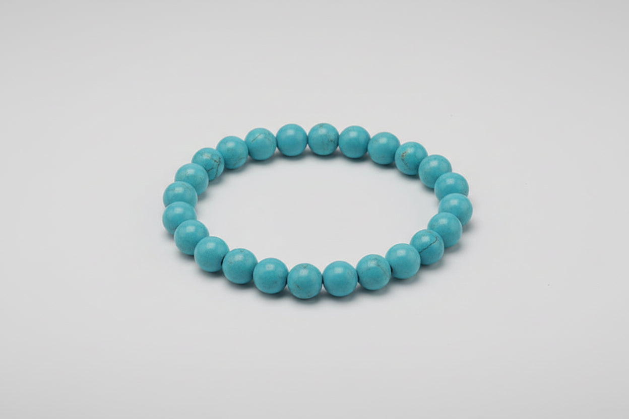 A beaded turquoise bracelet displayed against a white background with text highlighting the bracelet's name, a phone number, and price.