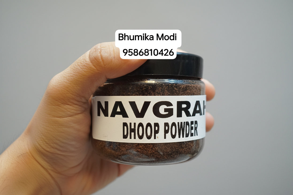 A jar labeled 'NAVGRAH DHOOP POWDER' held in a person's hand against a red background.