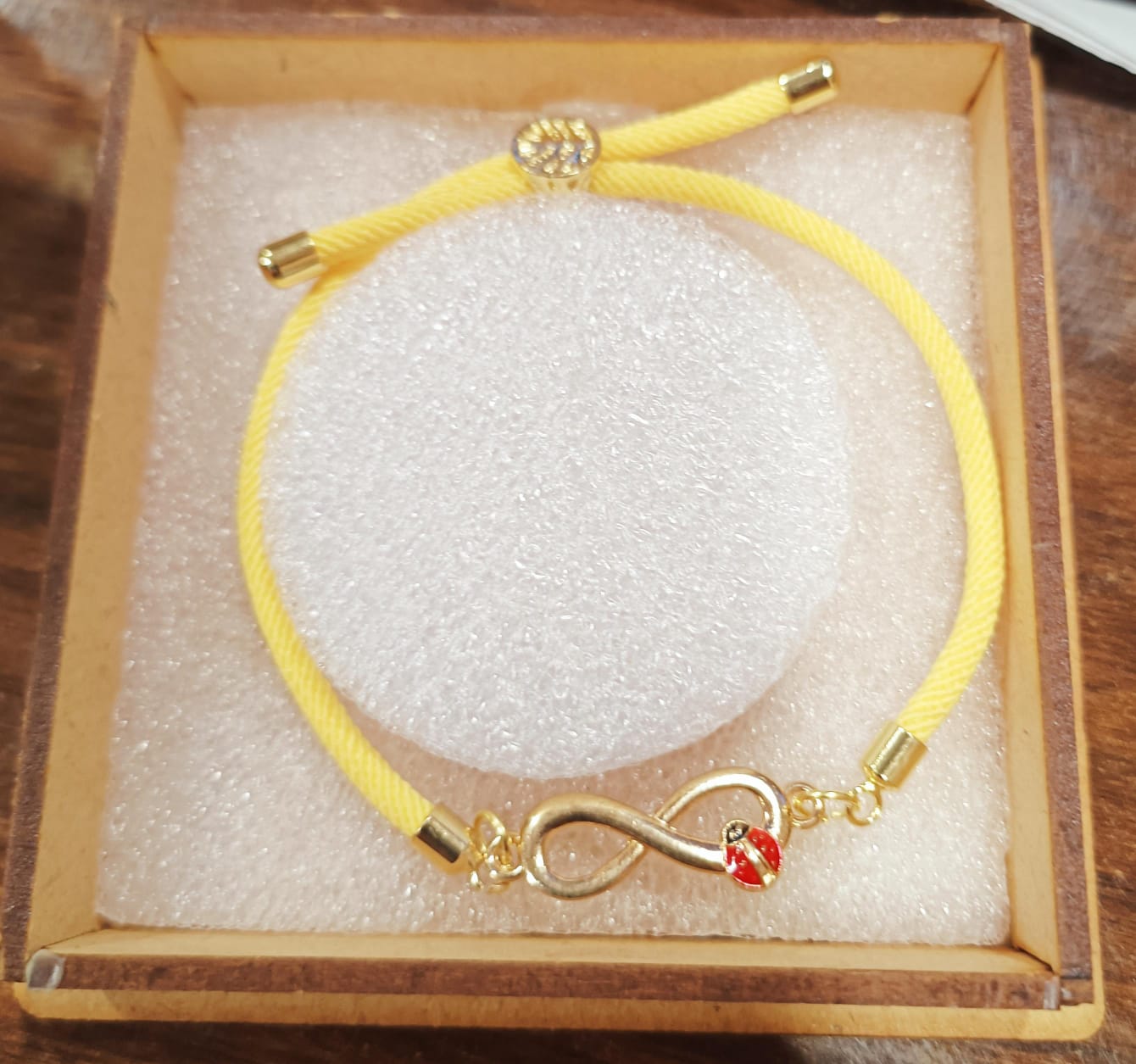 Yellow Thread Infinity Bug Bracelet