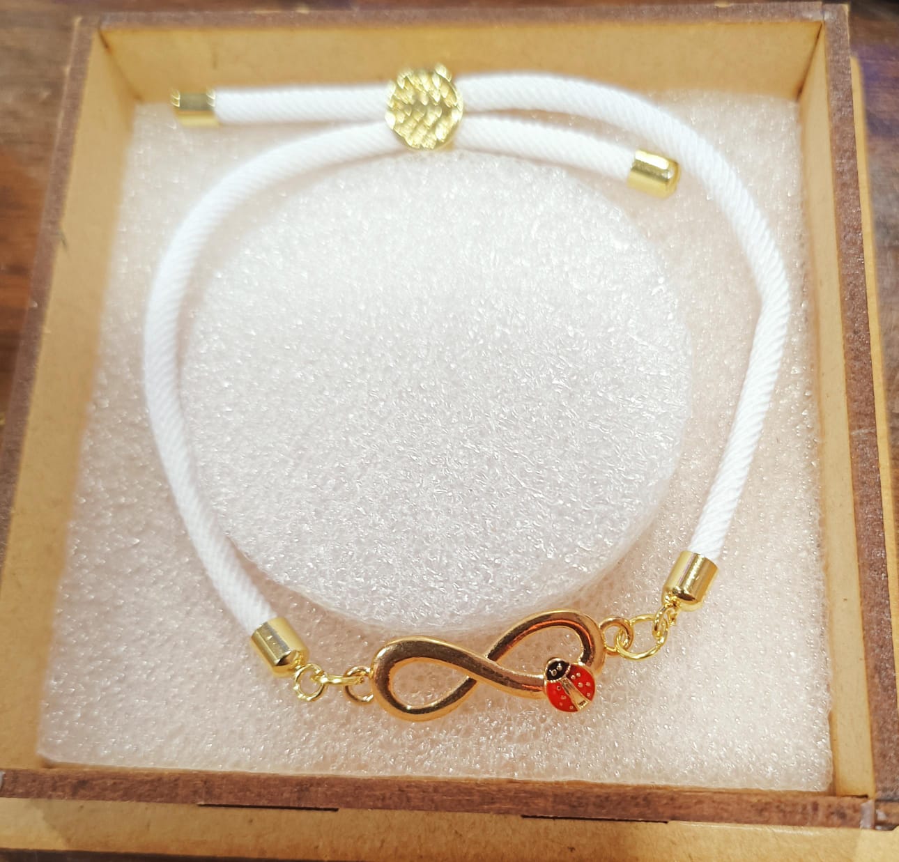 White Thread Infinity Bug Bracelet