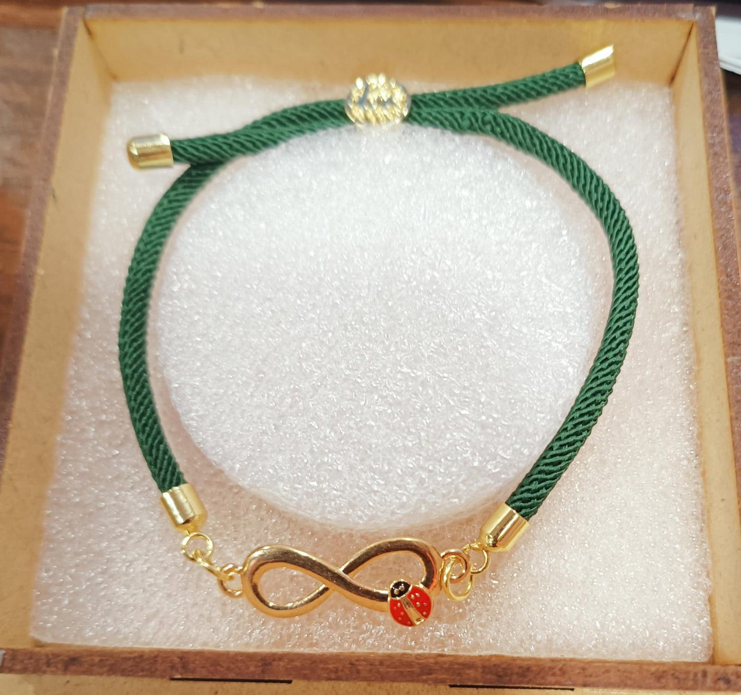 Green Thread Infinity Bug Bracelet